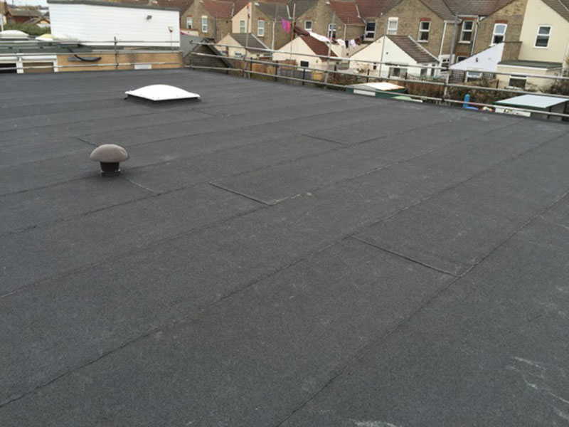 Ponding on Your Flat Roofing? We Can Fix It!